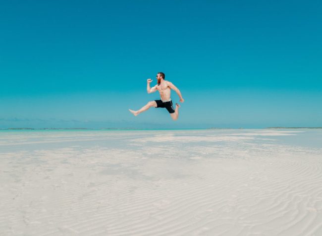 Man Jumping Beach Summer Smile