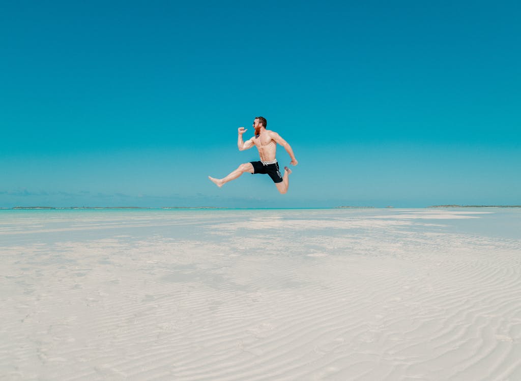 Man Jumping Beach Summer Smile