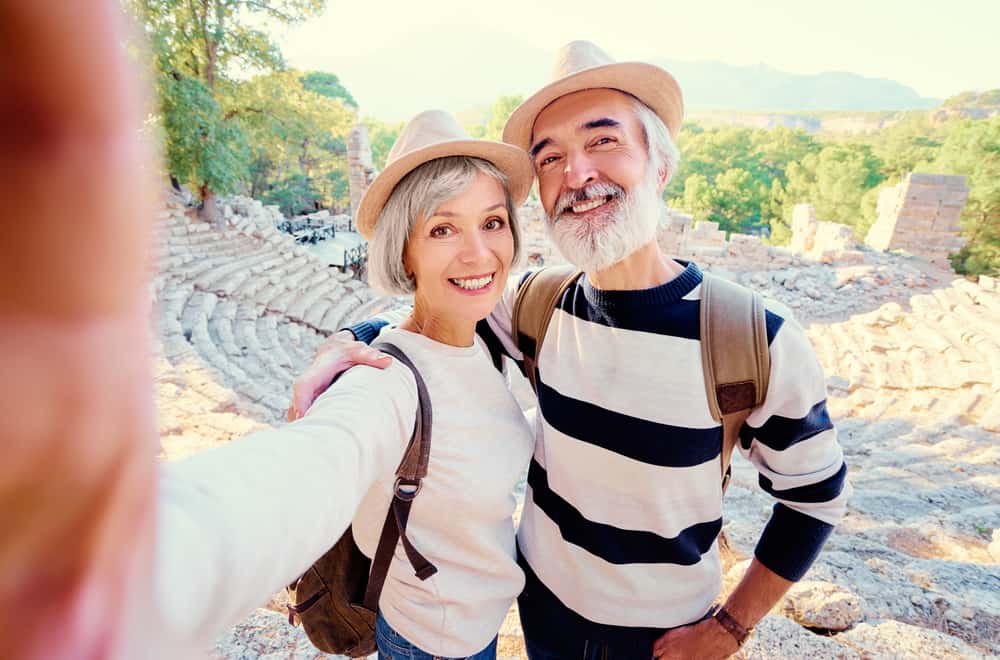 Couple Traveling with their new smiles