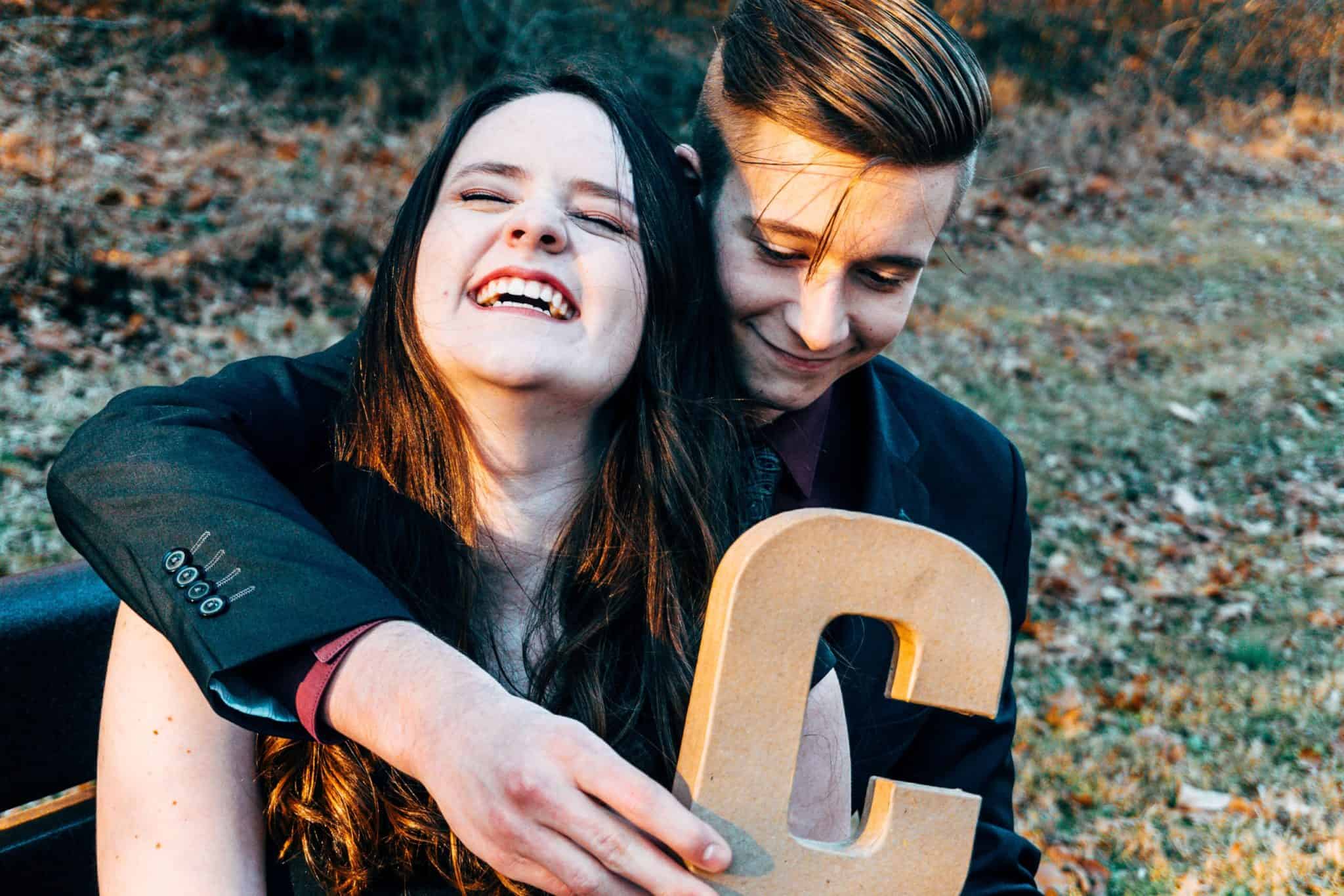 couple sharing a laugh outside