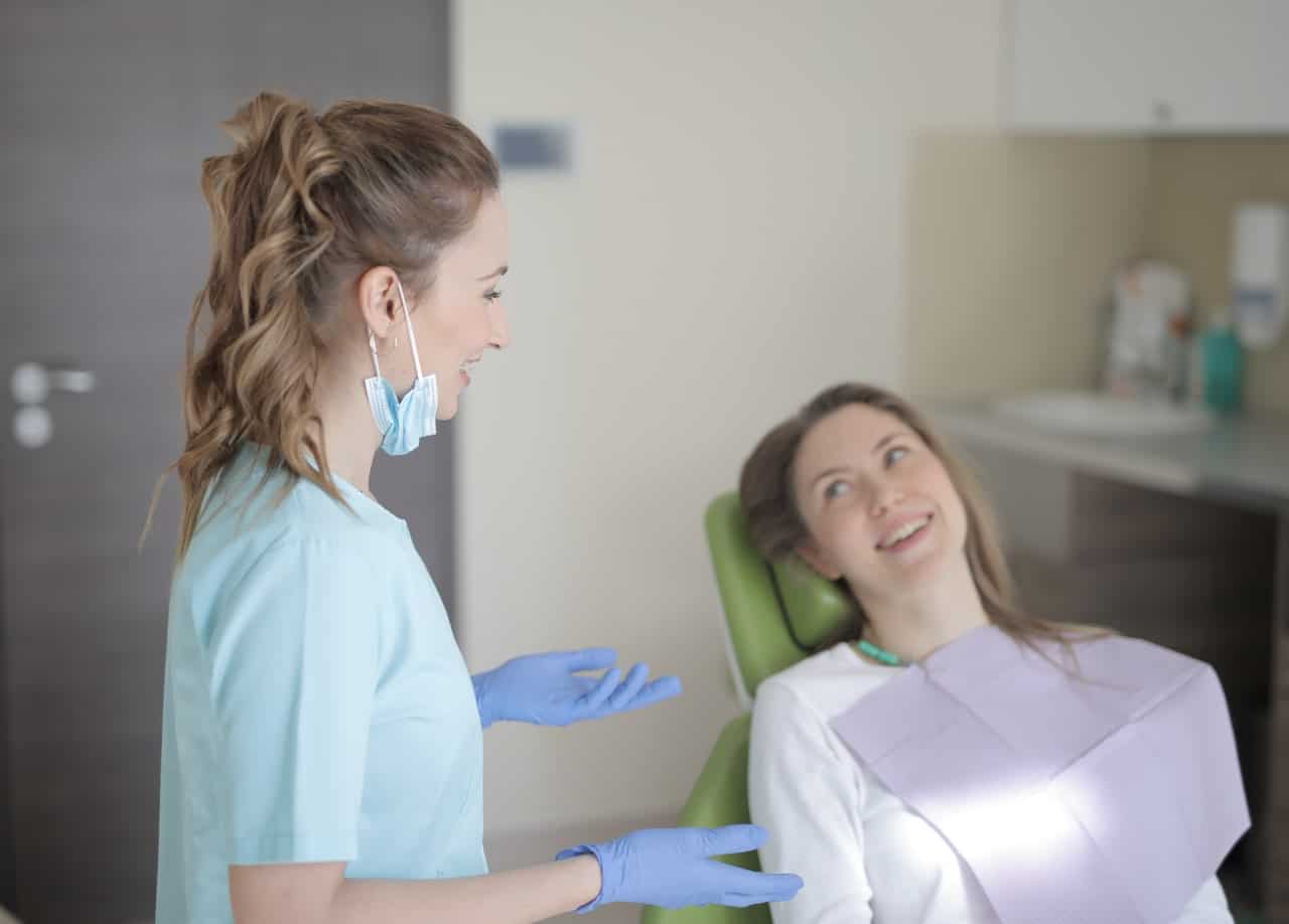 woman dentist woman patient