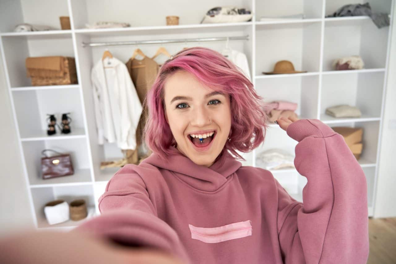 gen z influencer with pink hair