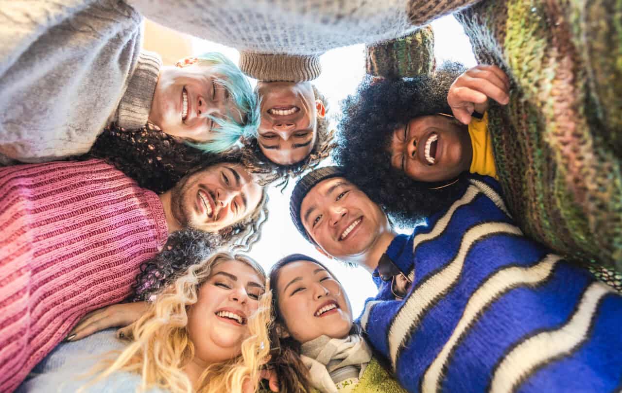 Diverse group of friends showing off their smile. 
